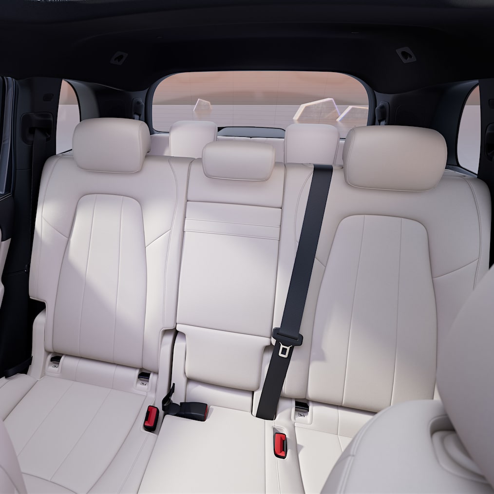 View from the front of the interior with rear seats and luggage compartment.