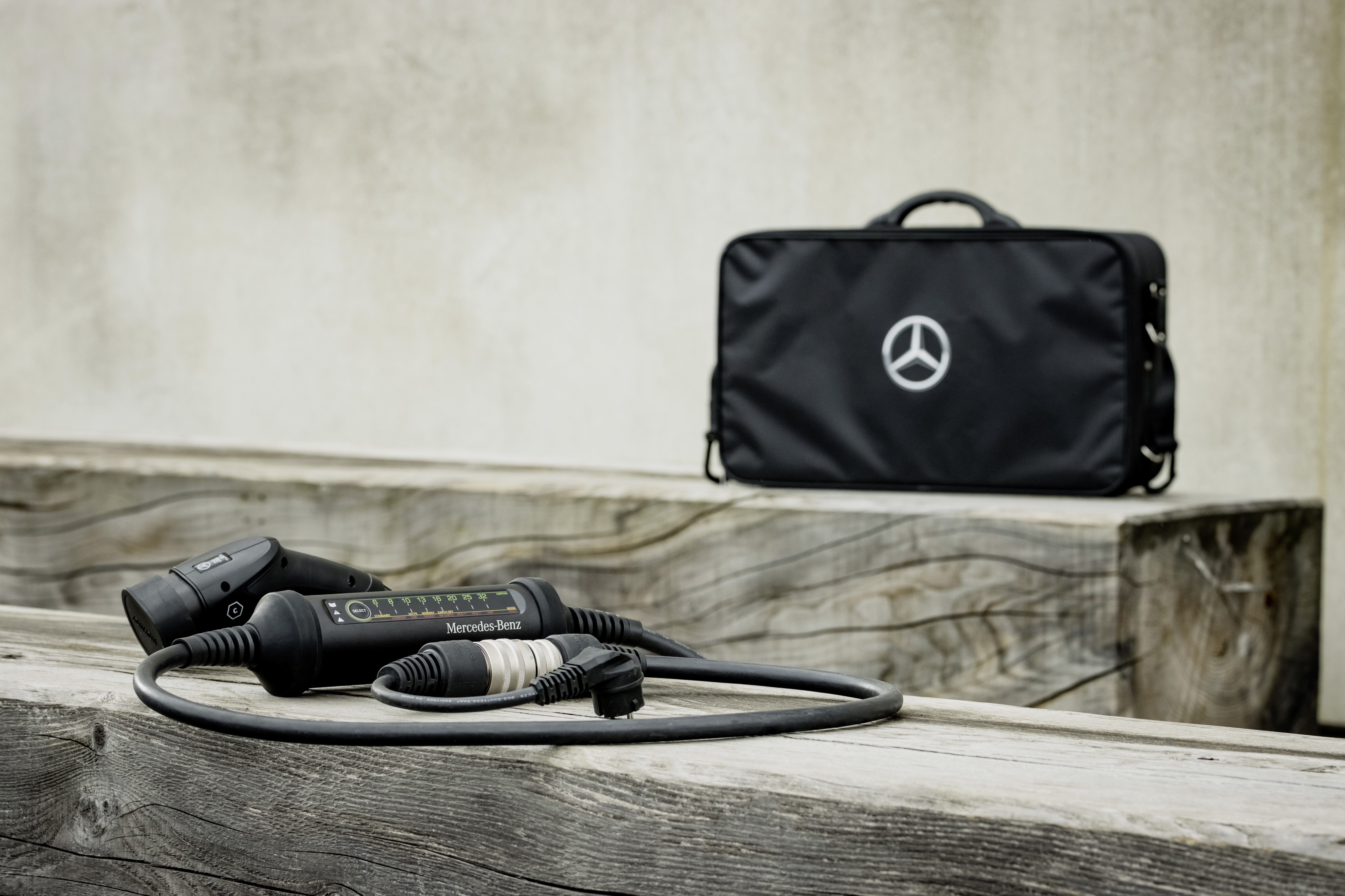 The Mercedes-Benz Flexible Charging System is contained within a practical black bag with a Mercedes star motif The Mercedes-Benz Flexible Charging System is hidden within a bag with Mercedes star motif