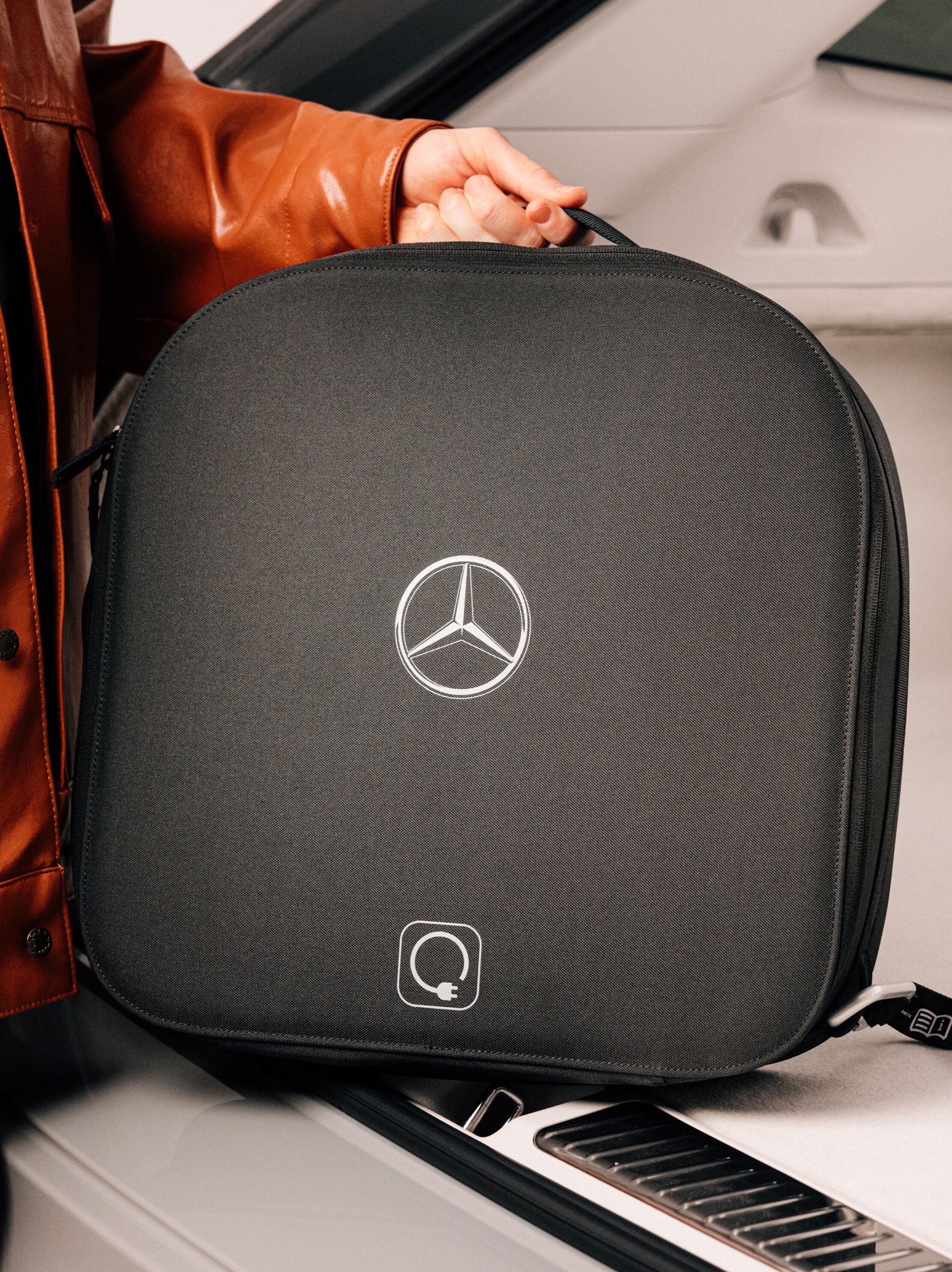 The EQB electric car charging at a Mercedes Benz Wallbox.