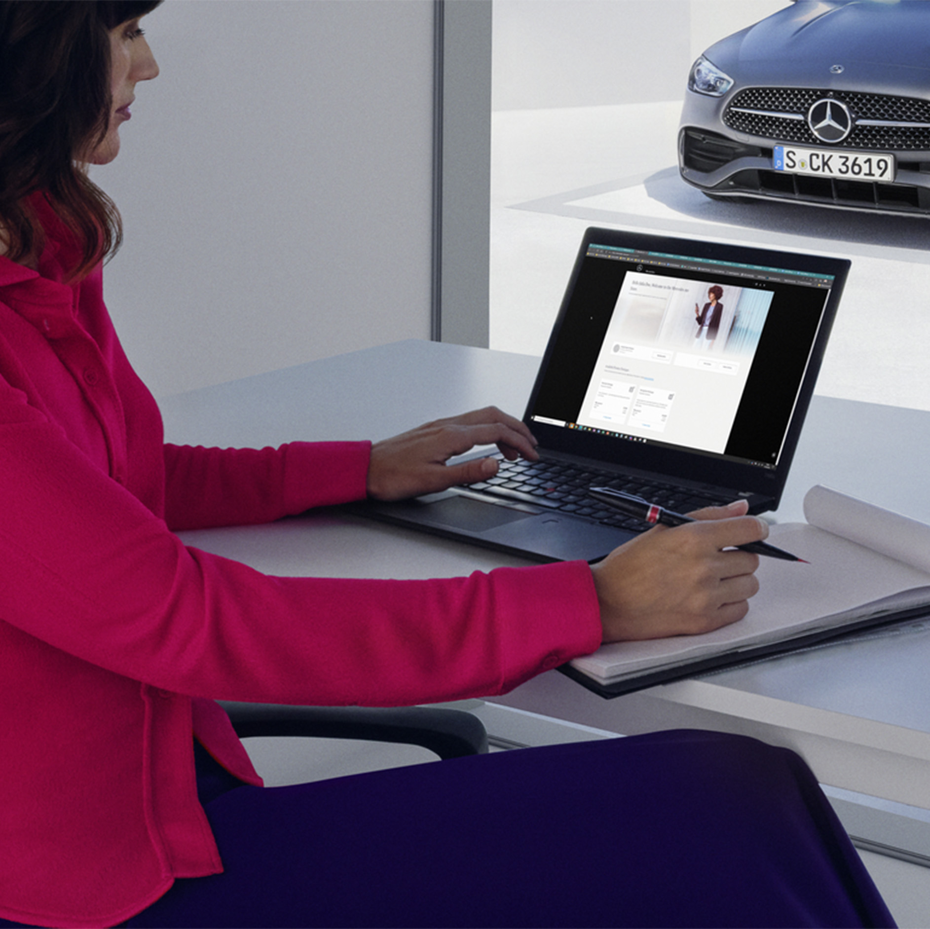 Mercedes me service app A person using the Mercedes me service app on their smartphones.